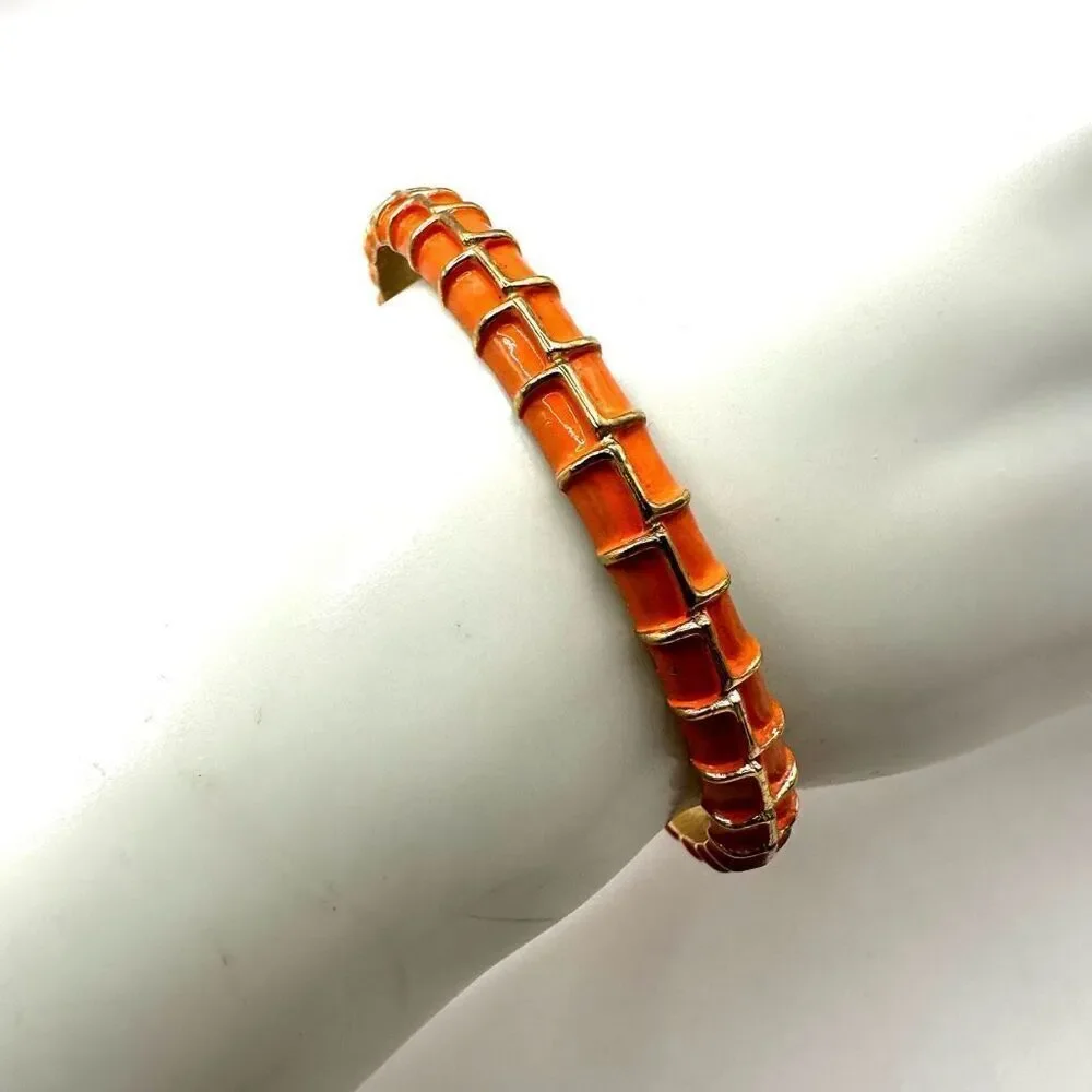Crown Trifari orange and gold gone enamel bangle bracelet
